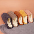 Fuzzy plush house slippers by Glow Ritual