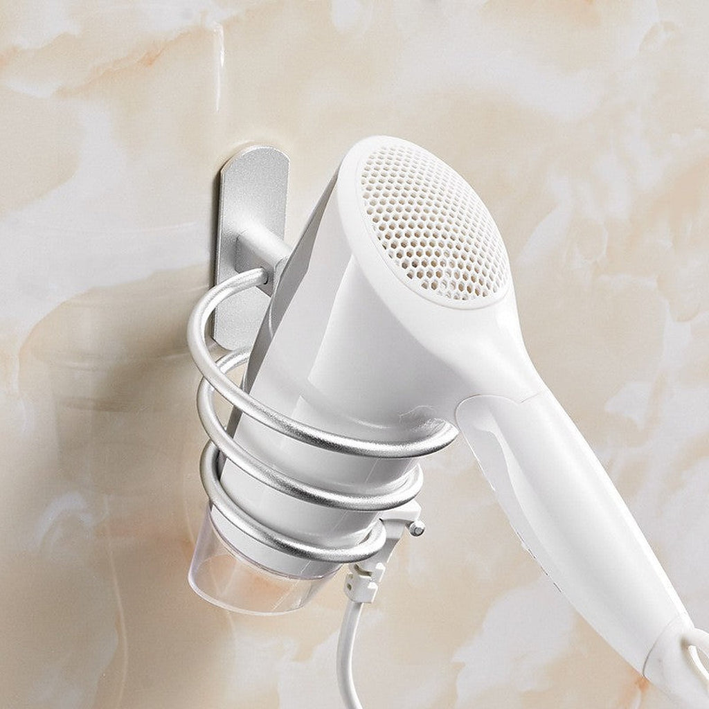 Wall-mounted hair dryer holder by Glow Ritual