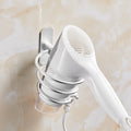 Wall-mounted hair dryer holder by Glow Ritual