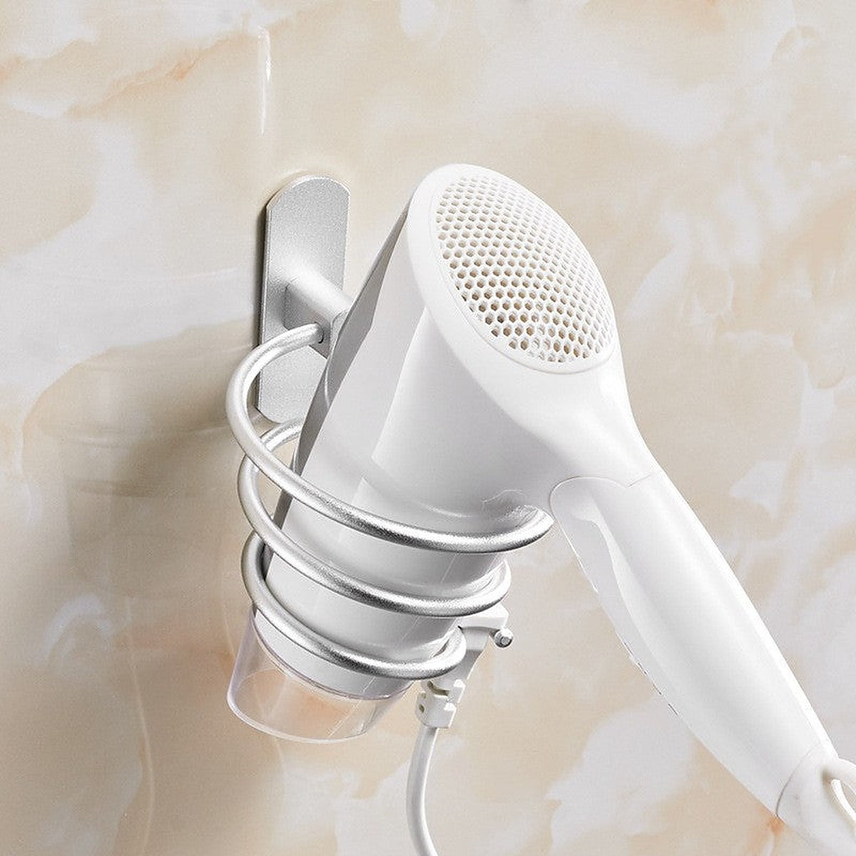 Wall-mounted hair dryer holder by Glow Ritual