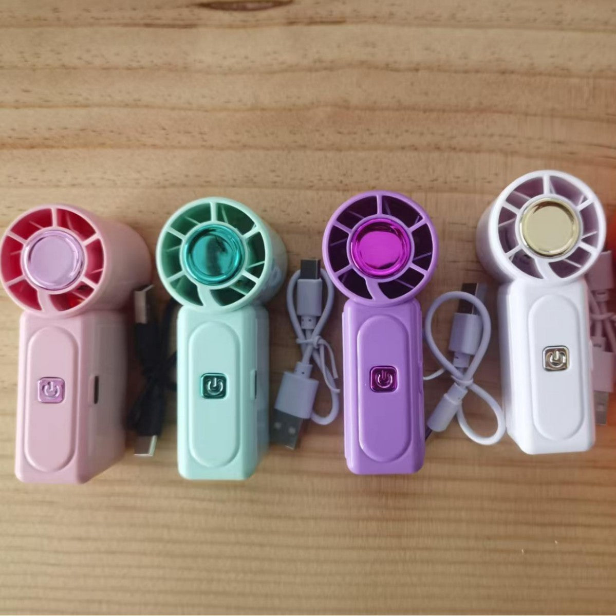 Mini handheld fan by Glow Ritual