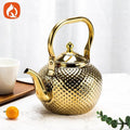 Hammered stainless teapot by Glow Ritual