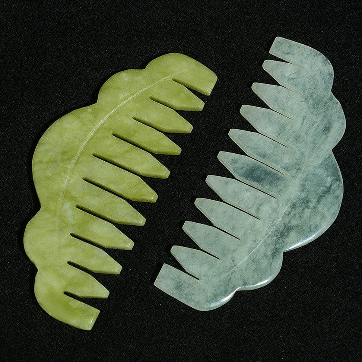 Natural jade gua sha comb by Glow Ritual