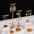 Gold earring stand by Glow Ritual