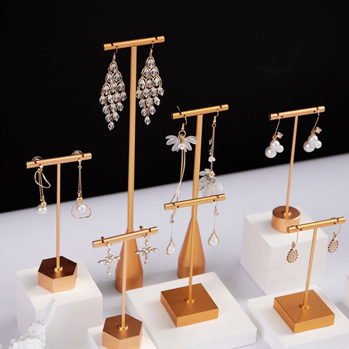 Gold earring stand by Glow Ritual