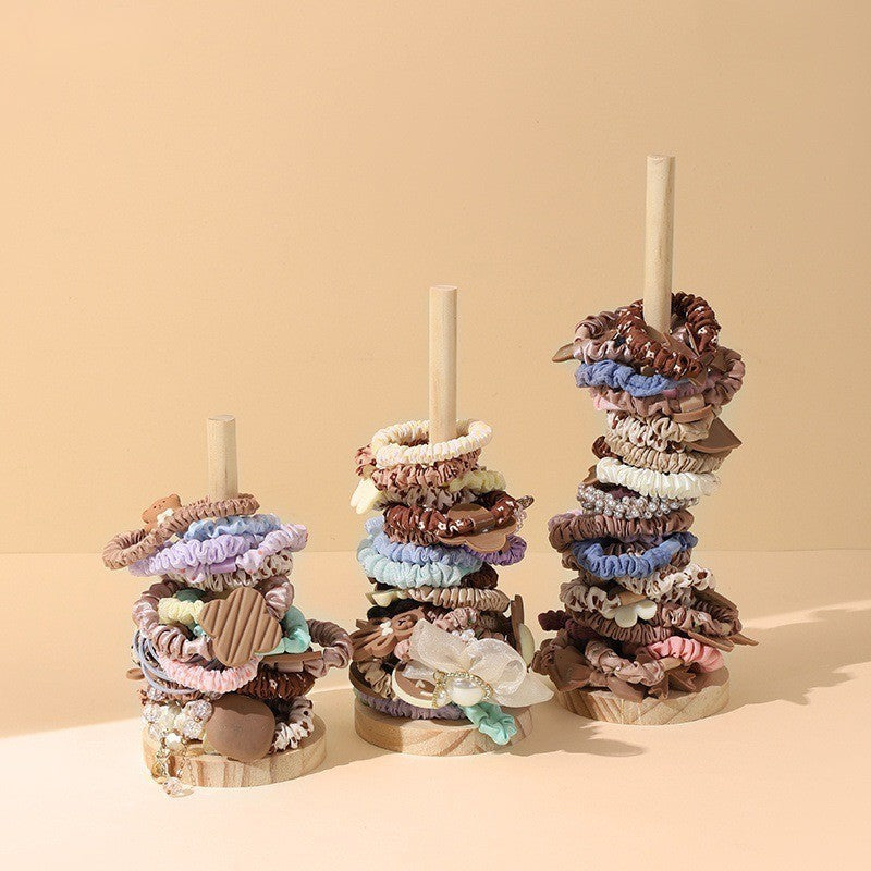 Wooden scrunchie holder stand by Glow Ritual