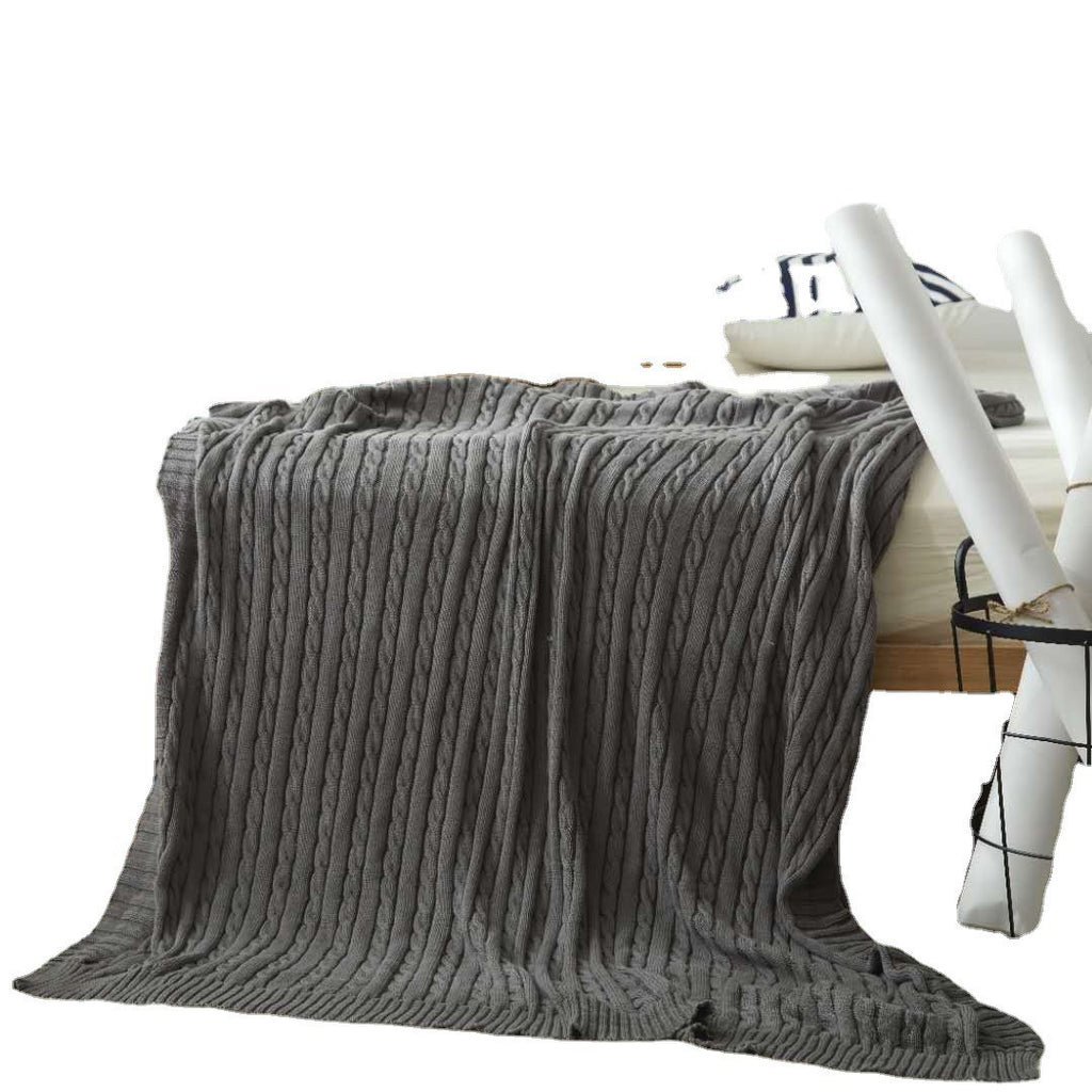 Cable knit throw blanket by Glow Ritual