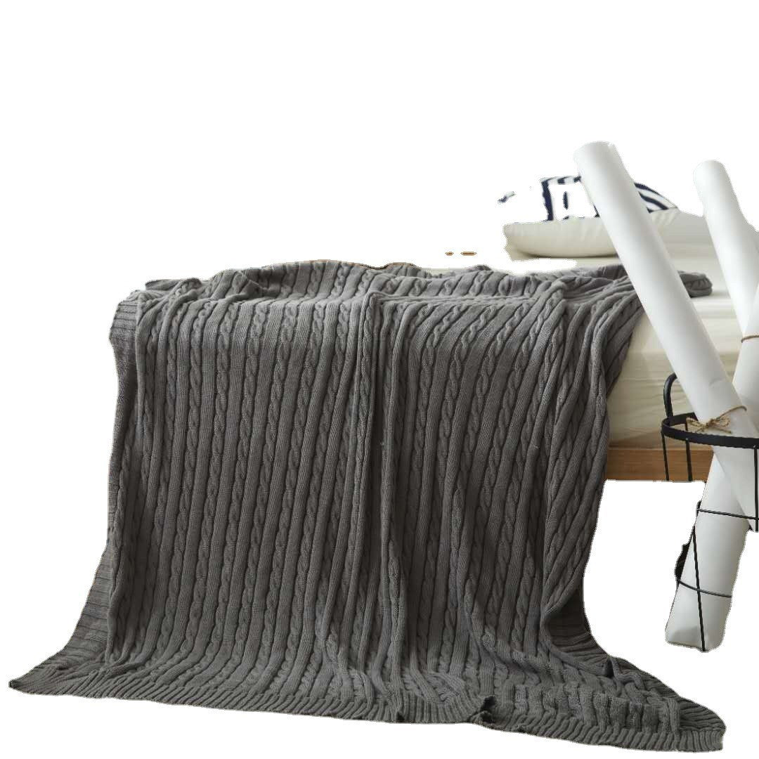 Cable knit throw blanket by Glow Ritual