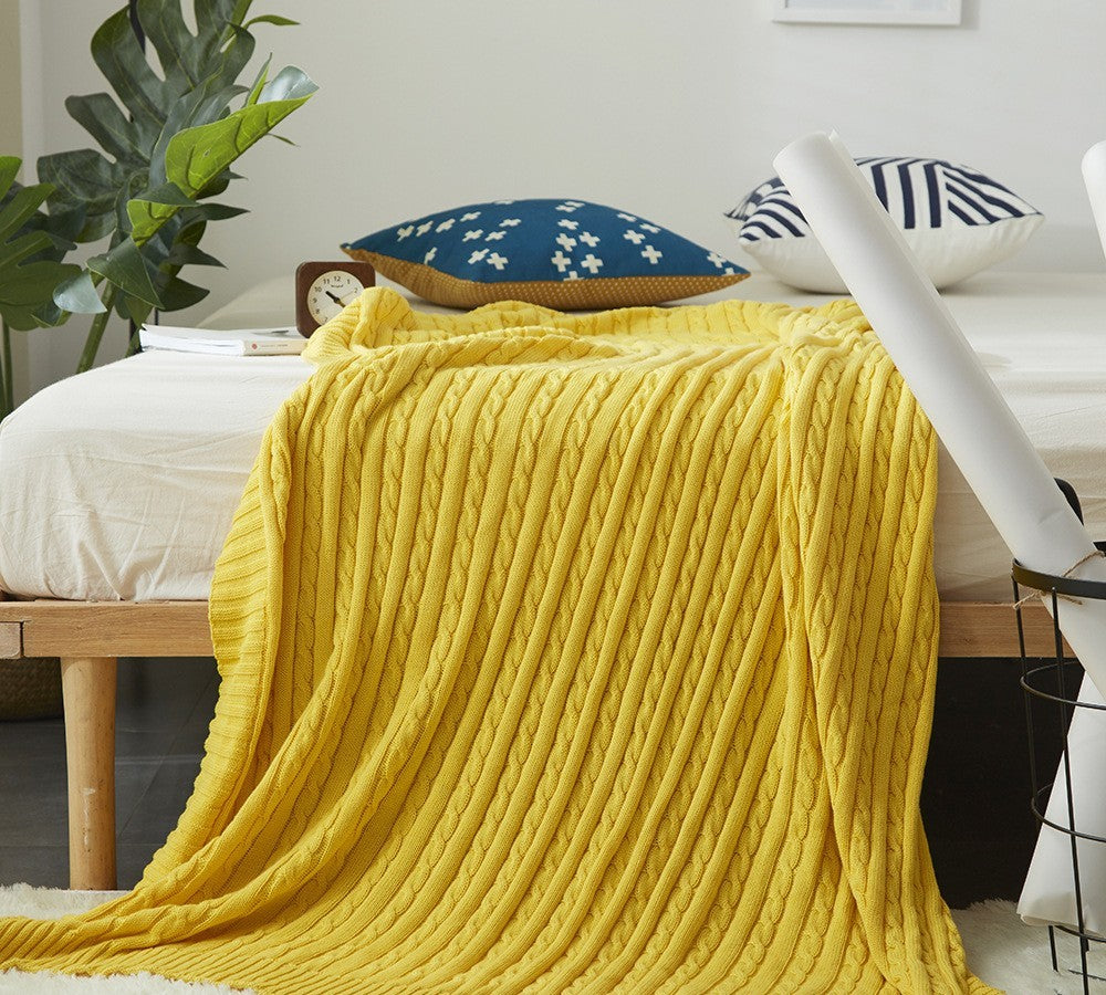 Cable knit throw blanket by Glow Ritual