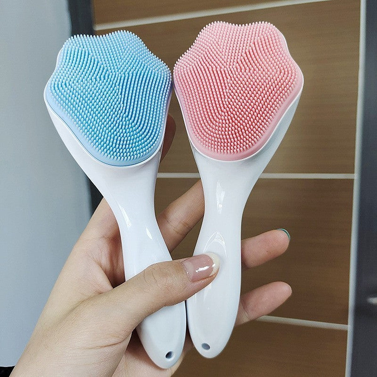 Soft silicone facial cleansing brush by Glow Ritual