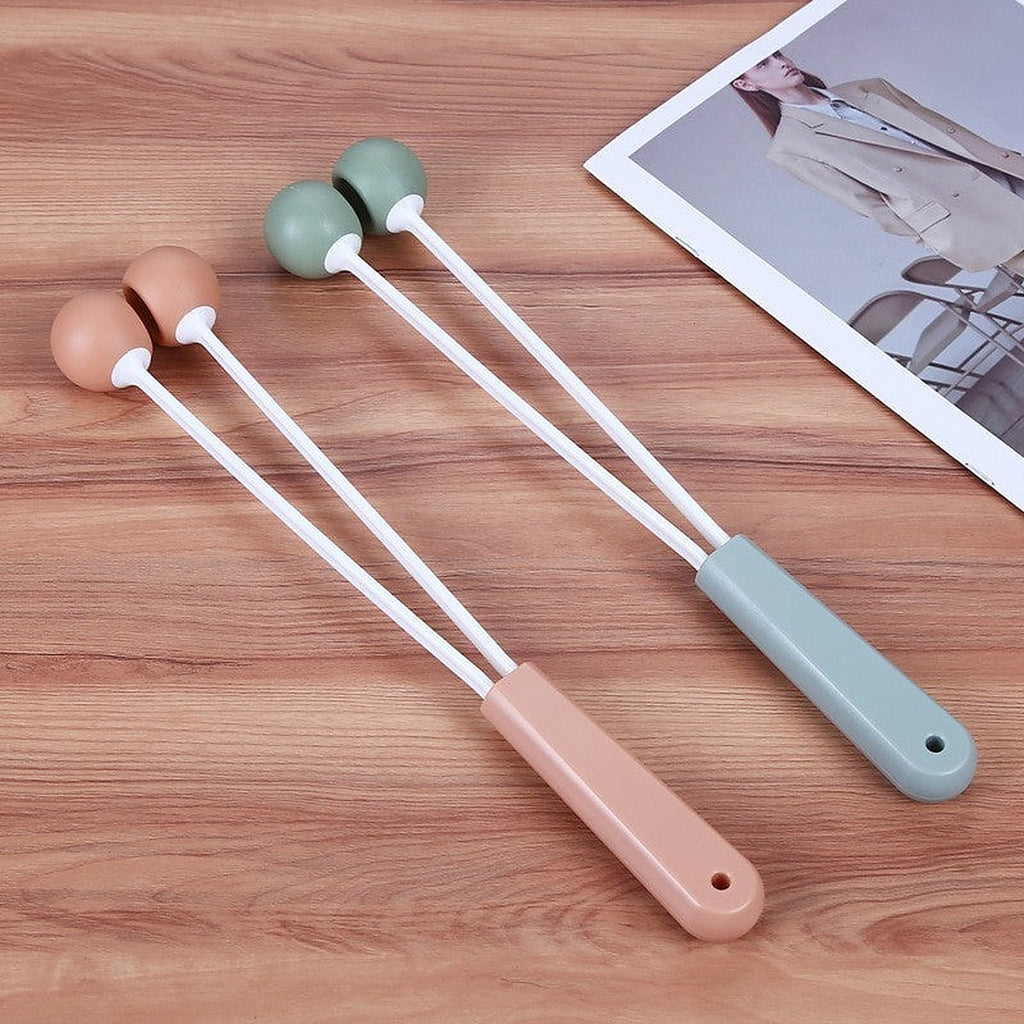 Handheld massage hammer by Glow Ritual