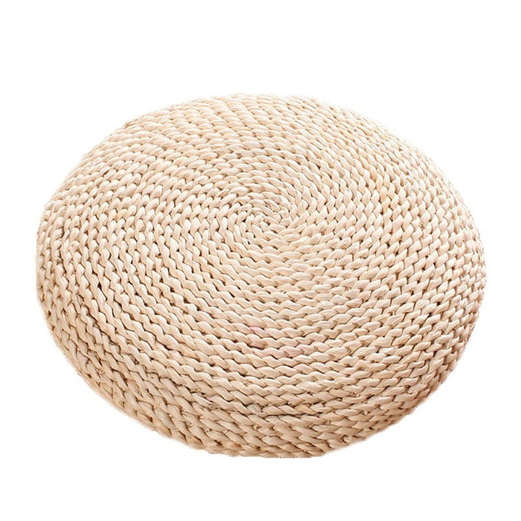 Woven straw meditation cushion by Glow Ritual
