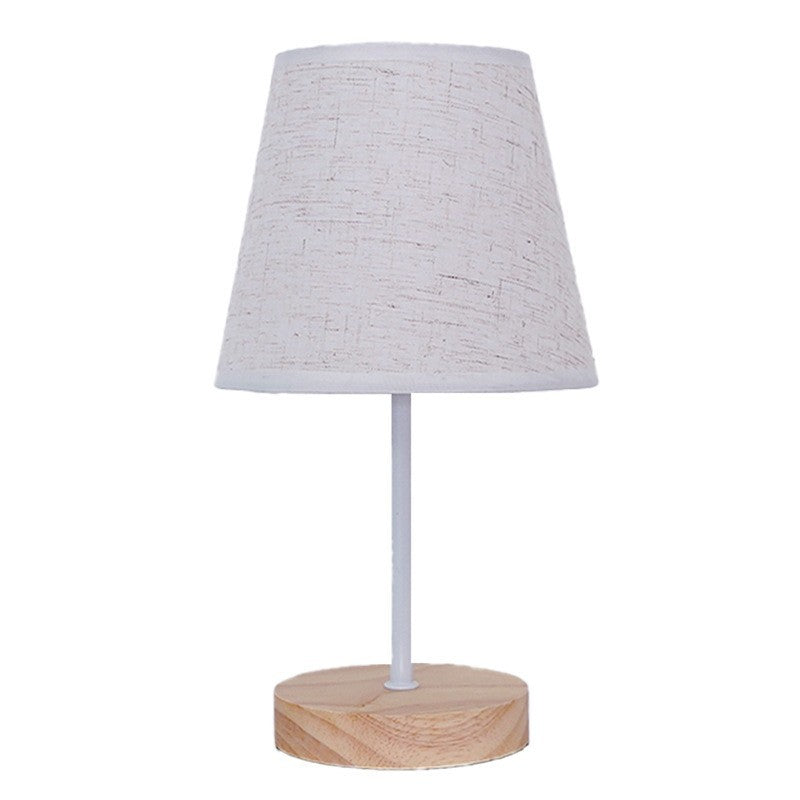 Solid wood bedside lamp by Glow Ritual