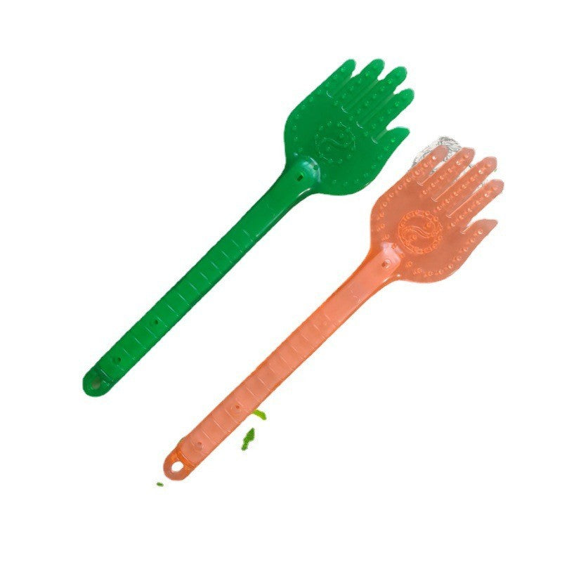 Silicone pat massage paddle by Glow Ritual