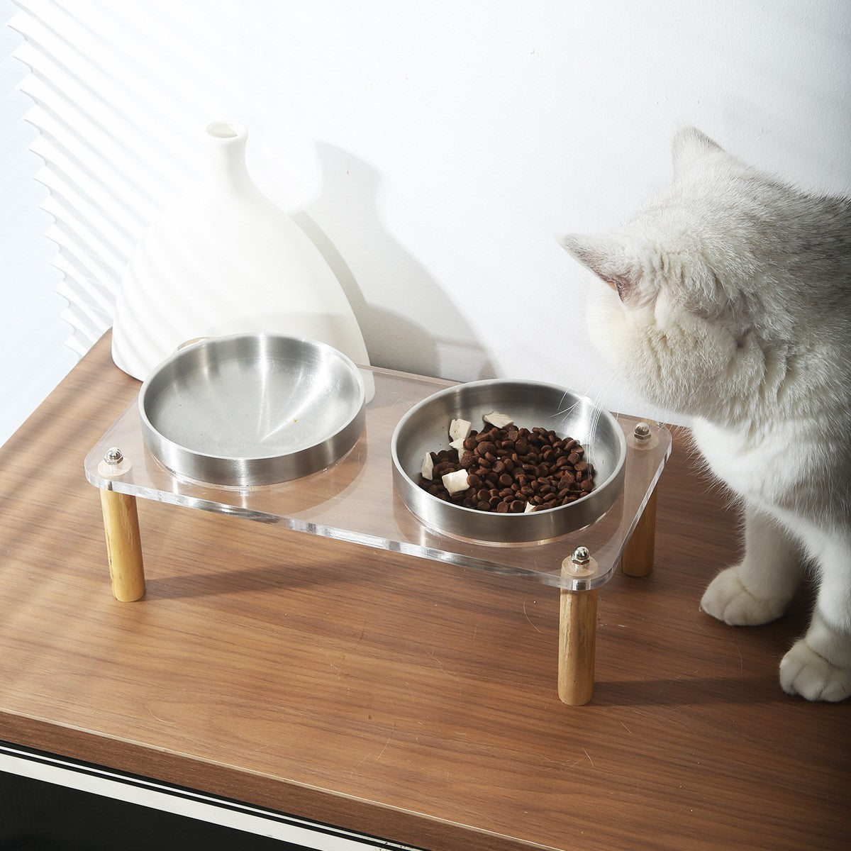 Elevated pet bowl stand by Glow Ritual