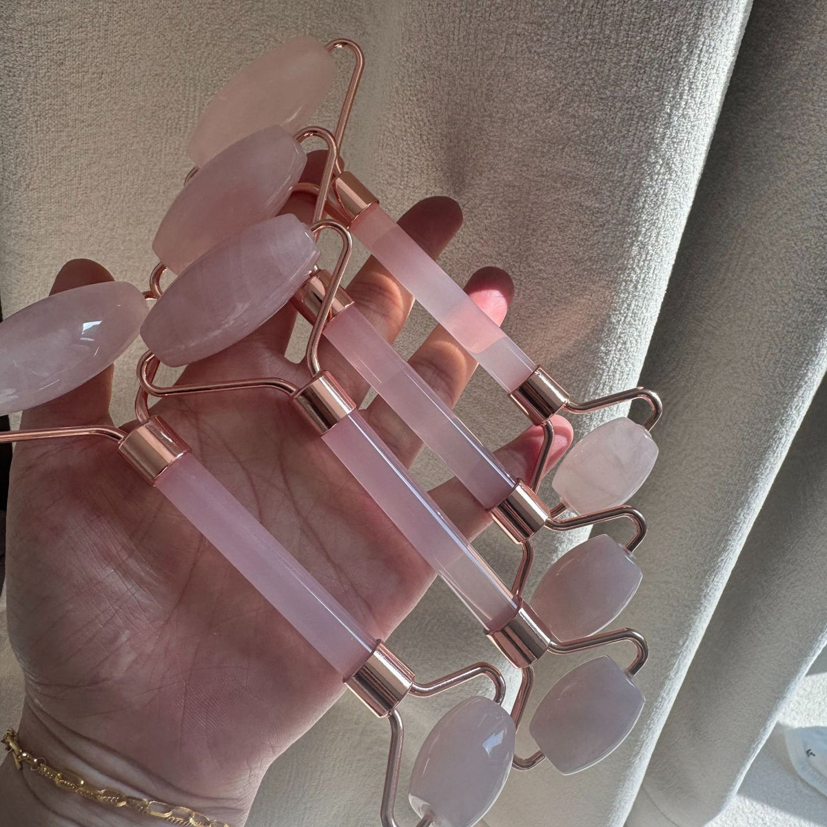 Rose quartz gua sha and face roller set by Glow Ritual