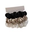Satin scrunchies set by Glow Ritual