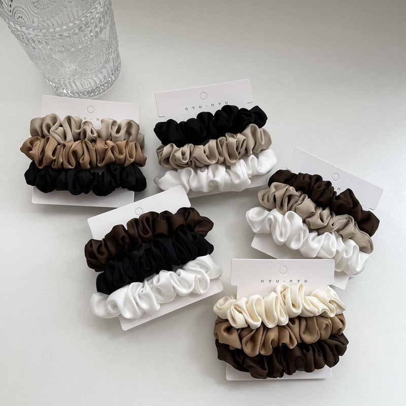 Satin scrunchies set by Glow Ritual