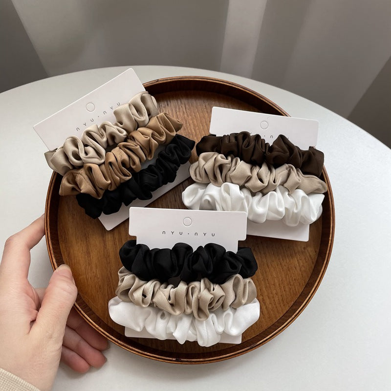 Satin scrunchies set by Glow Ritual