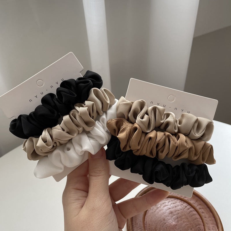 Satin scrunchies set by Glow Ritual