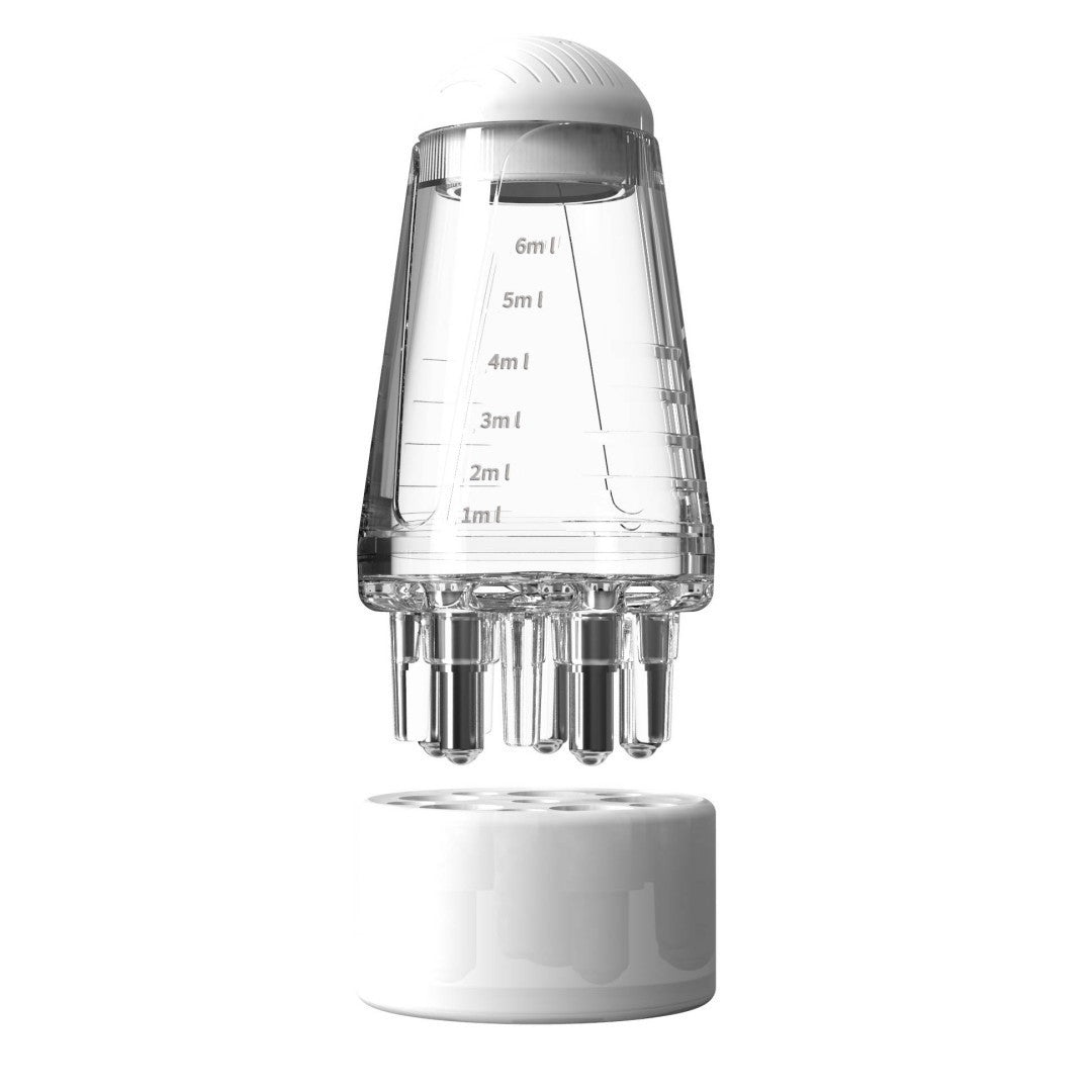 Scalp oil applicator comb by Glow Ritual