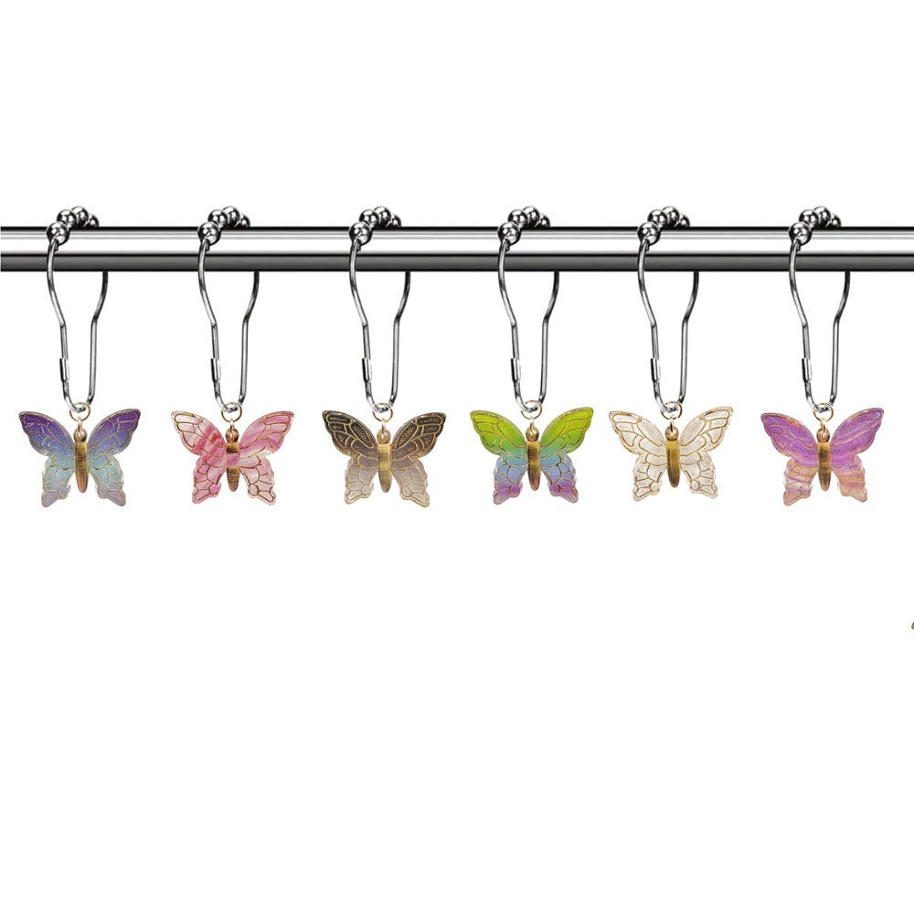 Butterfly shower curtain rings by Glow Ritual