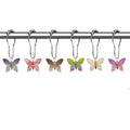 Butterfly shower curtain rings by Glow Ritual
