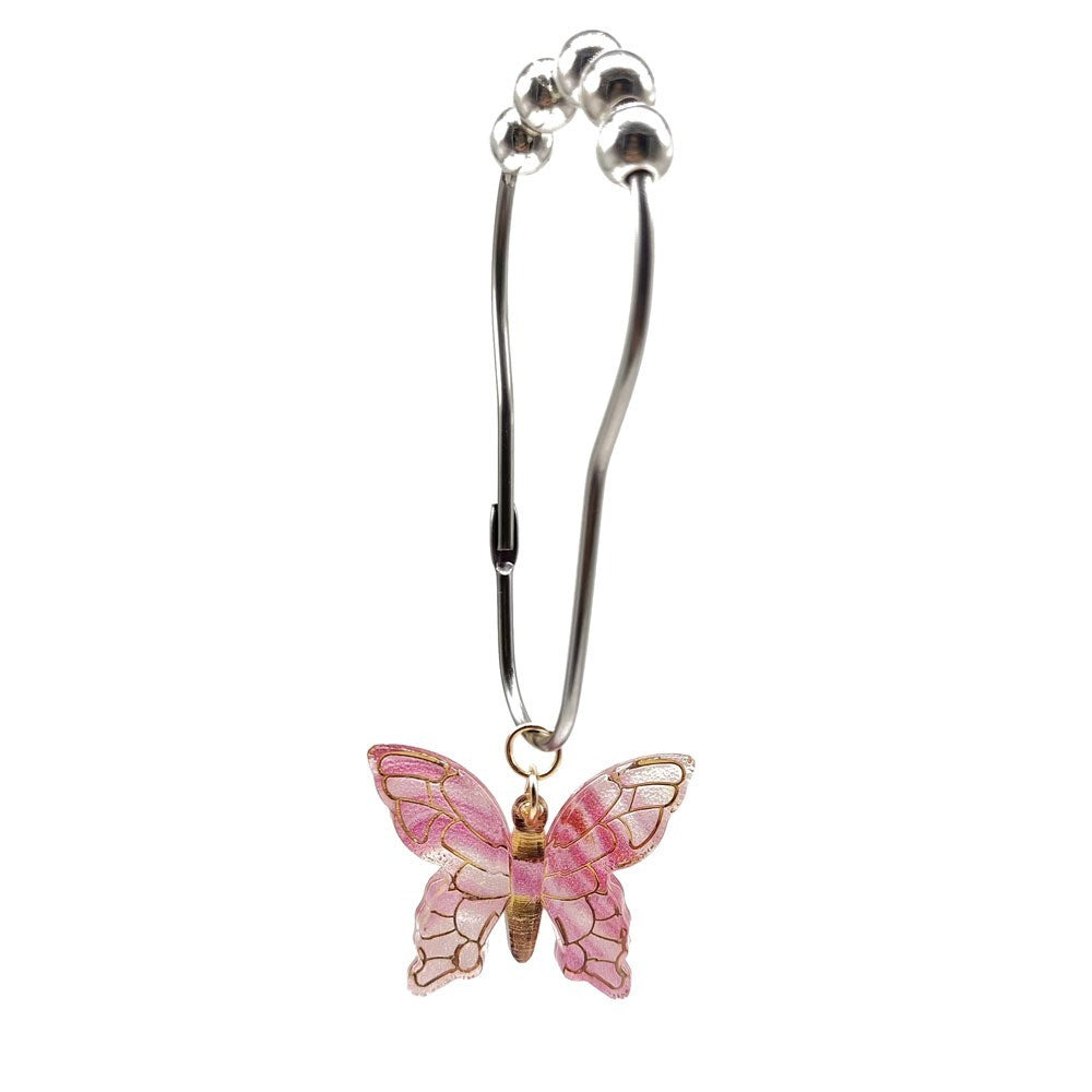 Butterfly shower curtain rings by Glow Ritual