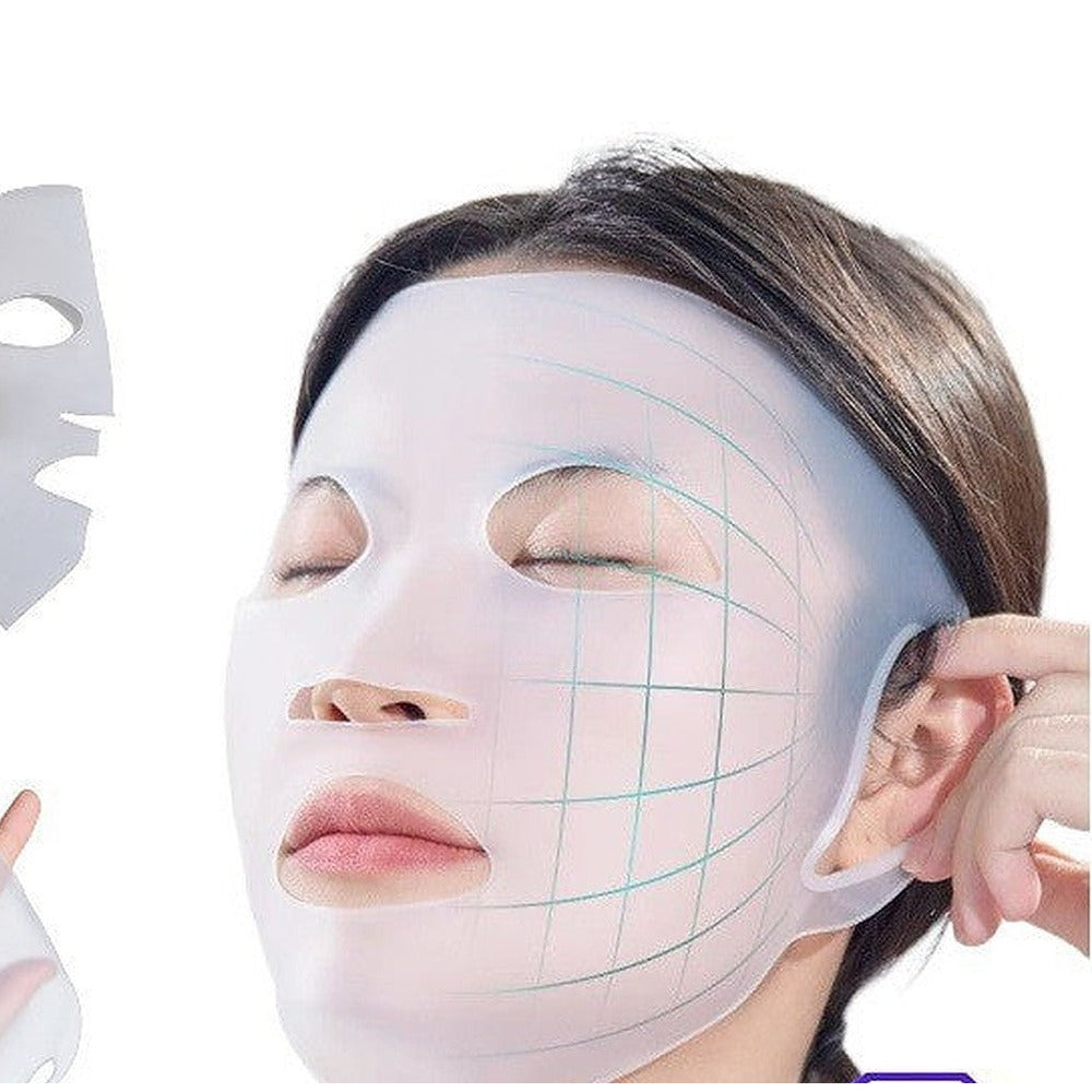 Woman wearing a reusable silicone sheet mask cover