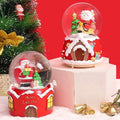 Musical Christmas snow globe by Glow Ritual