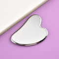 Stainless steel gua sha tool by Glow Ritual