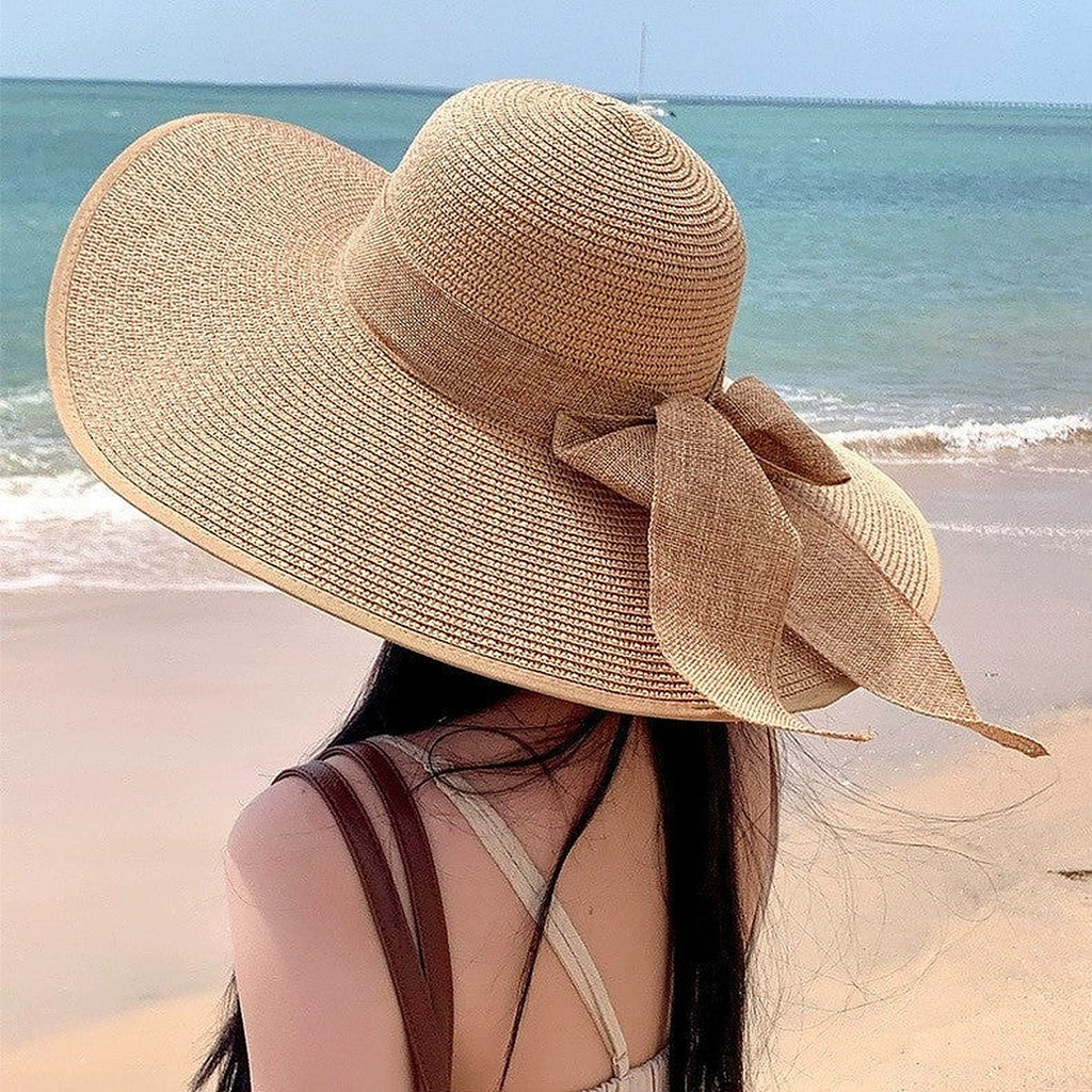 Wide brim straw sun hat by Glow Ritual
