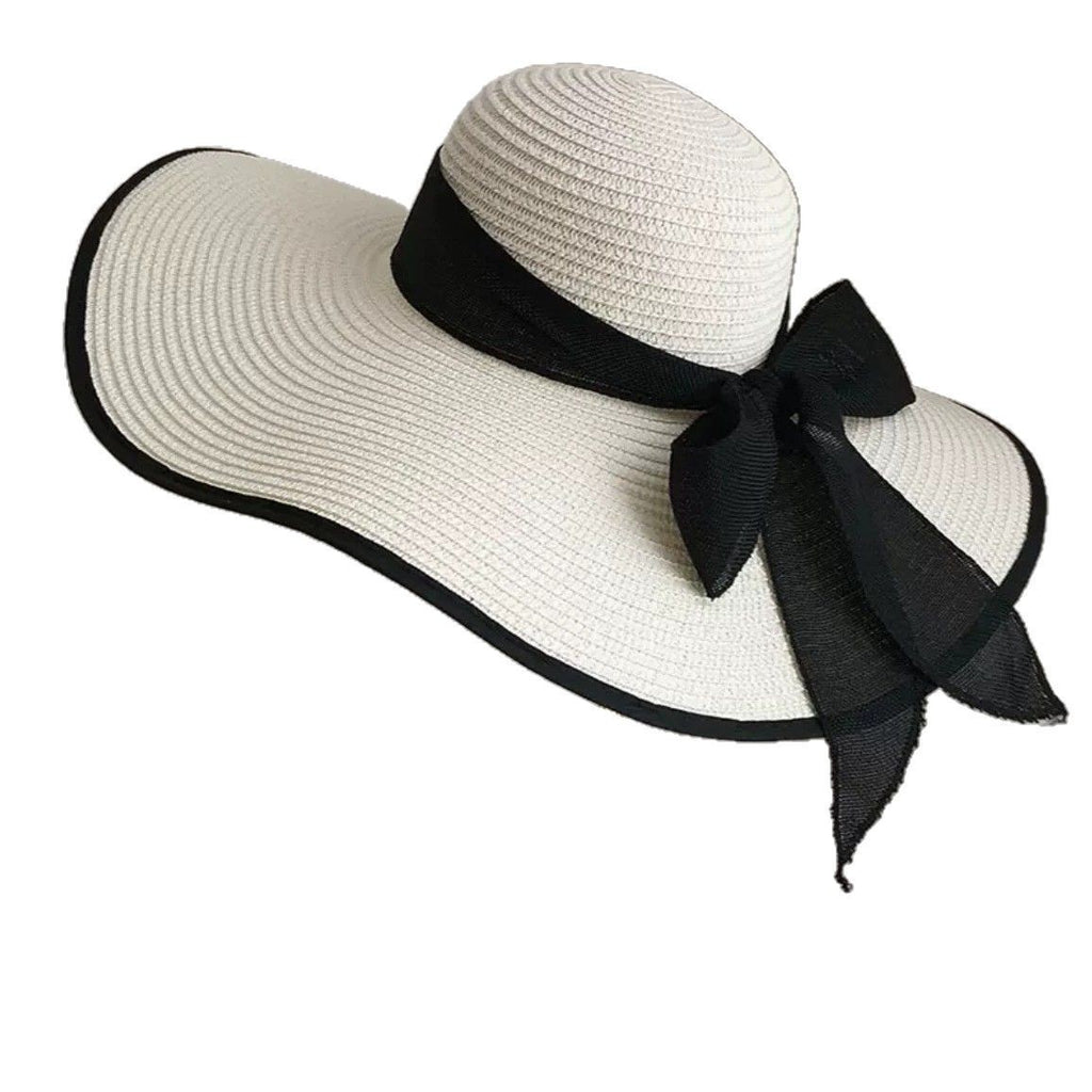 Wide brim straw sun hat by Glow Ritual
