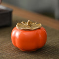 Ceramic persimmon tea canister by Glow Ritual