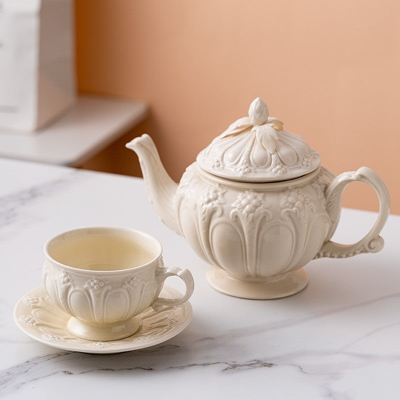 Embossed teacup and saucer by Glow Ritual