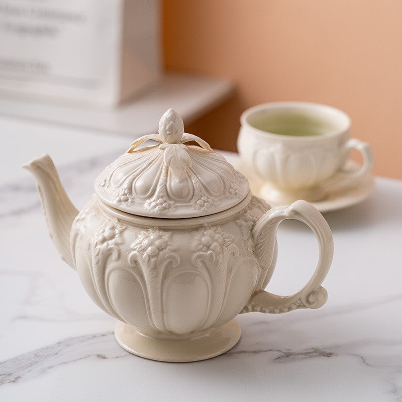 Embossed teacup and saucer by Glow Ritual