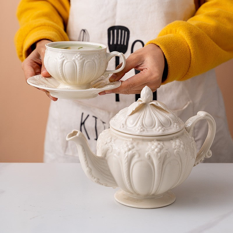 Embossed teacup and saucer by Glow Ritual
