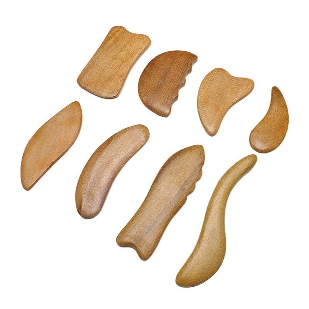 Sandalwood gua sha board by Glow Ritual
