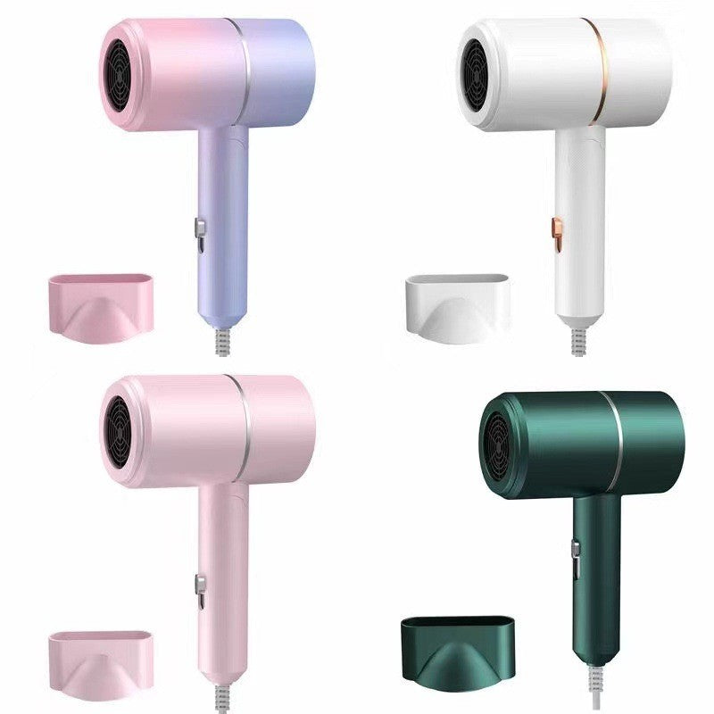 Folding travel hair dryer by Glow Ritual