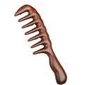Wide-tooth sandalwood comb by Glow Ritual