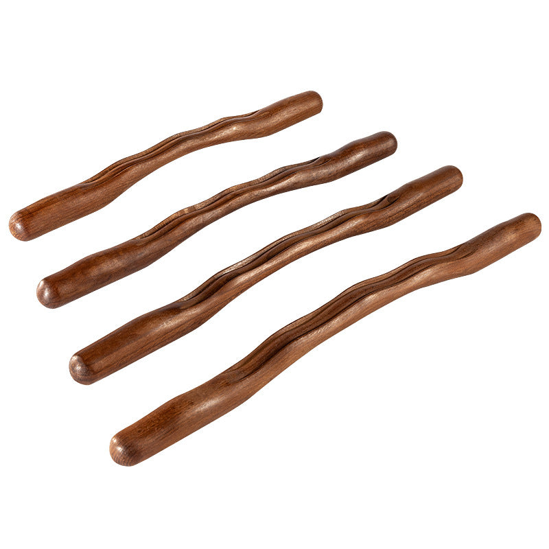 Wooden gua sha body massage stick by Glow Ritual