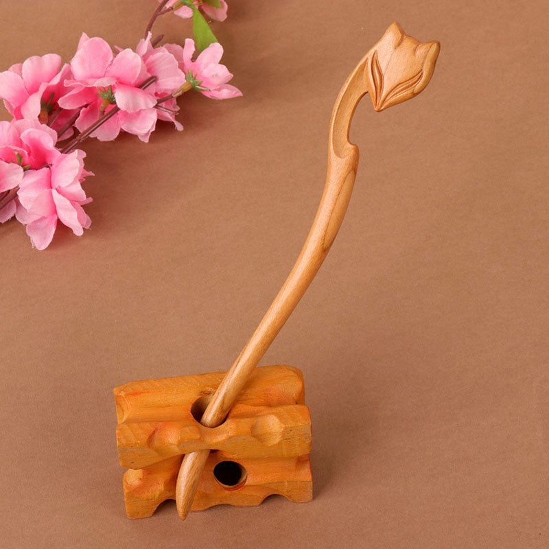 Carved wooden hair stick by Glow Ritual