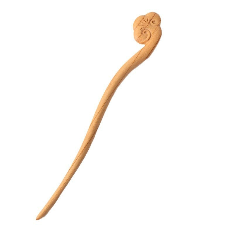 Carved wooden hair stick by Glow Ritual